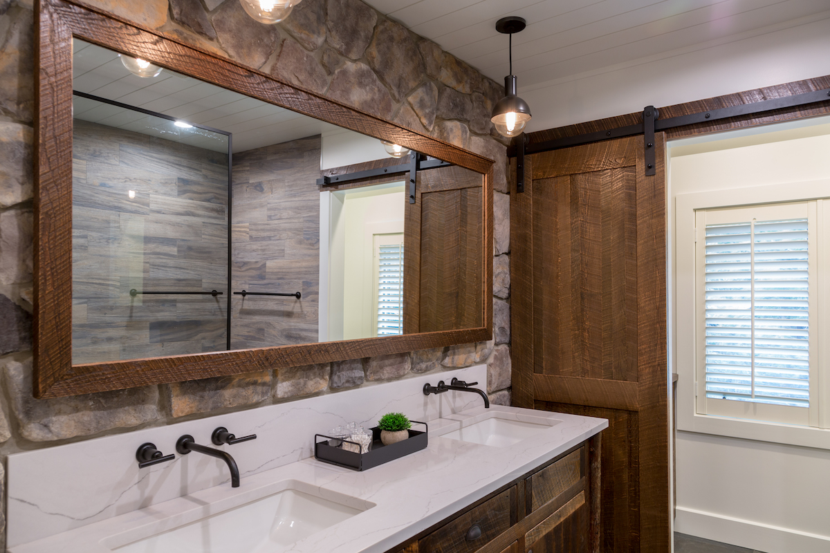 primary-bathroom-stone-wall-vanity-design