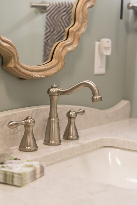 bathroom-sink-detail-stainless-steel-faucet